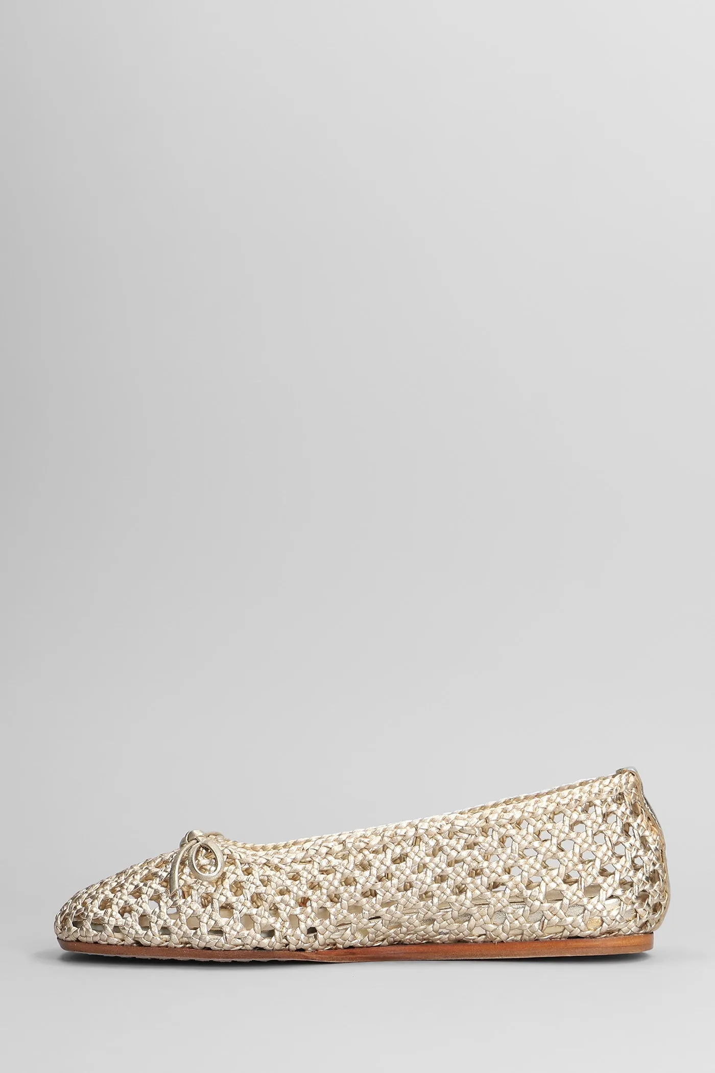 Ballet flats in gold leather