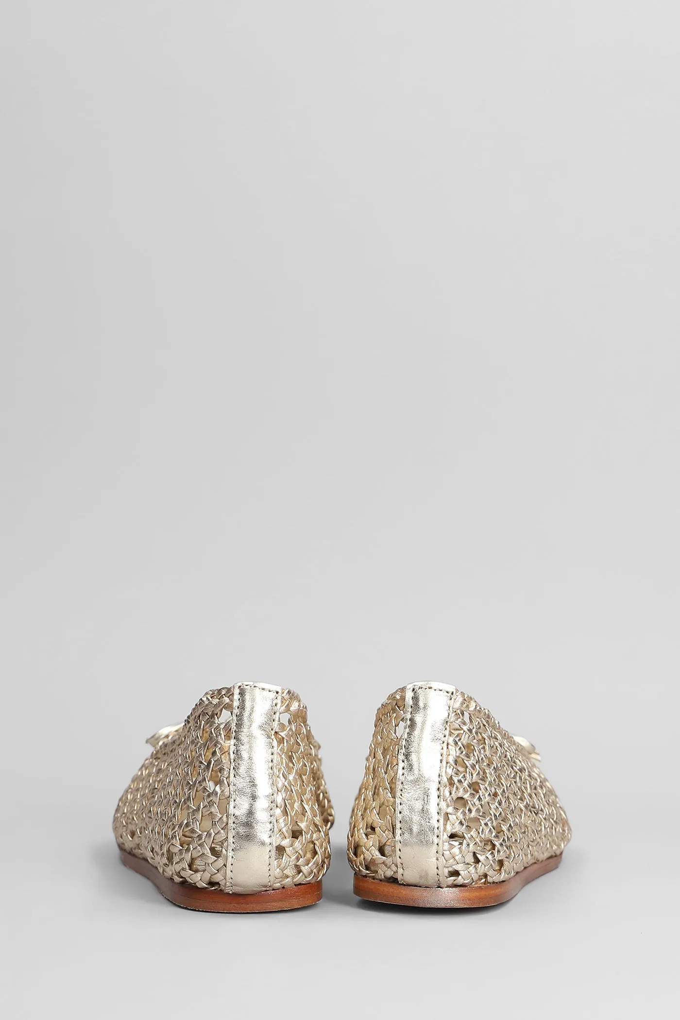 Ballet flats in gold leather